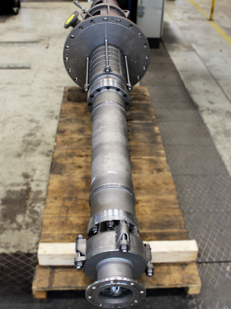 Front view of a GLVX vertical tank suspension pump placed on a wooden pallet. 