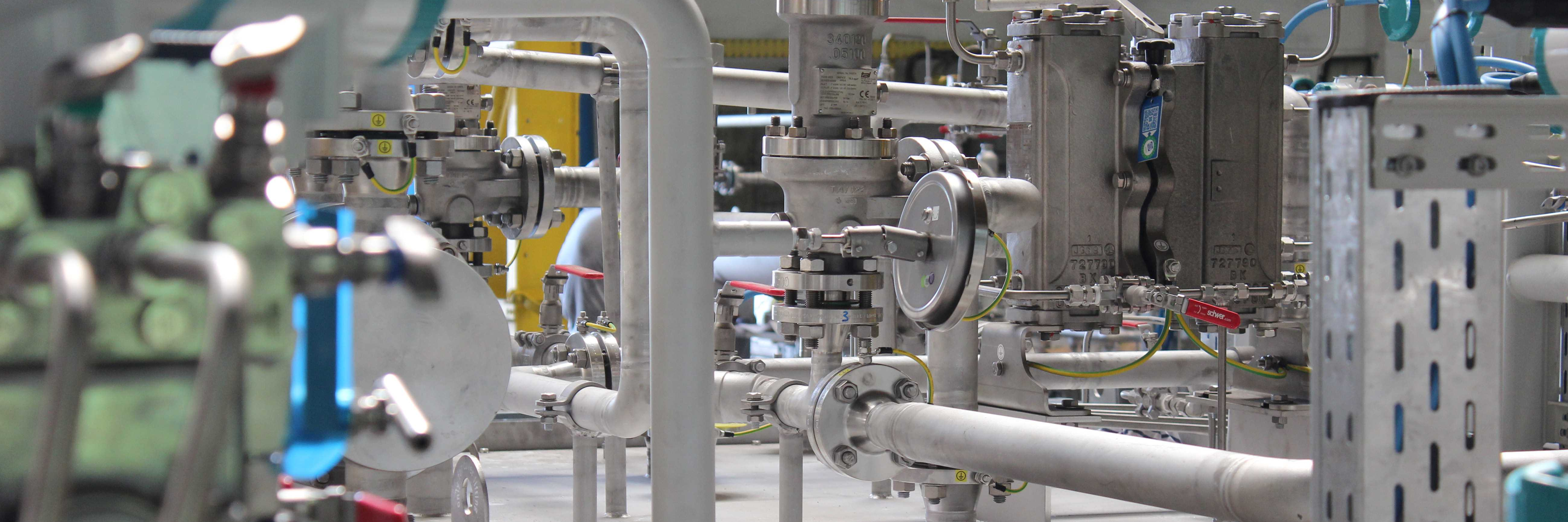 A close-up of a lubricating oil system at Apollo's plant engineering department in Gößnitz