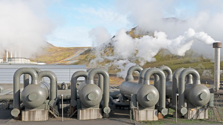 AdobeStock_285966313_Steam_Separators_at_a_Geothermal_Energy_Plant_wildnerdpix.jpg 