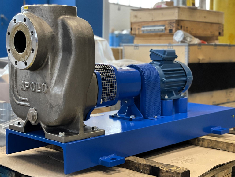 Close-up of an Apollo self-priming KRES brine pump with cast Apollo logo in the casing.