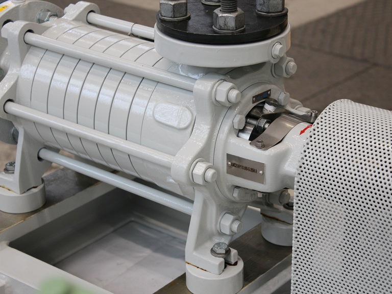 Side view of an Apollo Gößnitz KCD multistage side channel pump with white paint finish, fully assembled and ready for packaging and delivery.